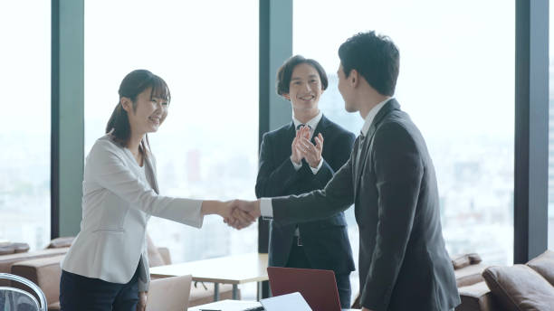 istock asian business group working in the office 1335142536