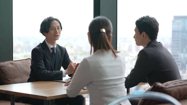 istock asian business group working in the office 1335142592