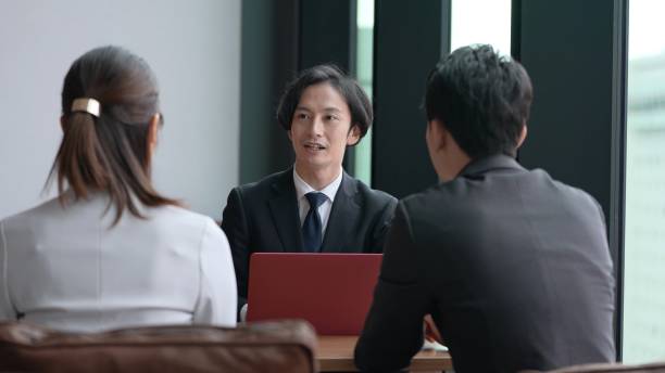istock asian business group working in the office 1335142596