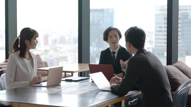 istock asian business group working in the office 1335142603