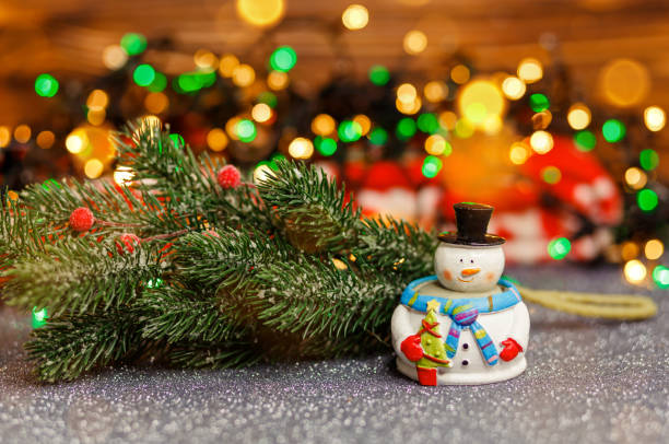 istock Xmas decoration on abstract background. Christmas card with snowman. 1335145256