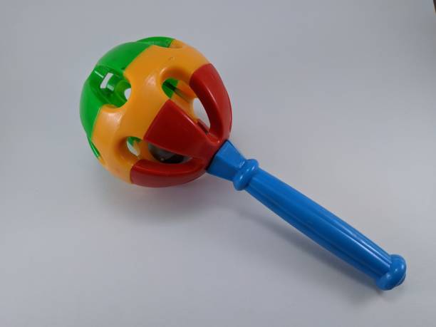 baby toy is round with silicone to bite and make a sound isolated on white background