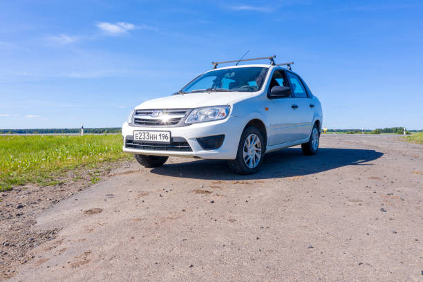 Moscow, Russia - July 13, 2020: Russian car Lada Granta on summer sunny road