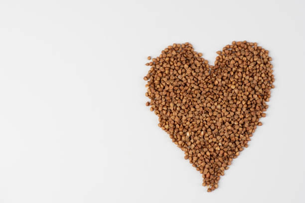 istock Raw buckwheat groats on a white background 1335161549