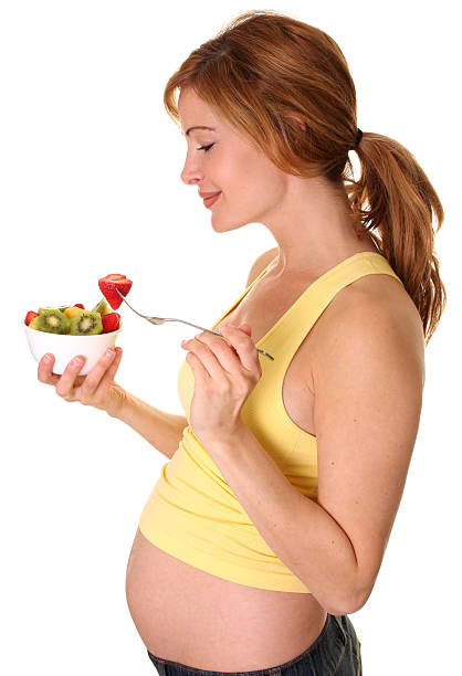 kobieta w ciąży z owocami - healthy eating profile tropical fruit fruit zdjęcia i obrazy z banku zdjęć