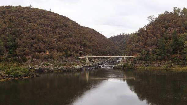 istock panoramic view of cliffs and native tree park area at Cataract gorge national park, Launceston, Tasmania, Australia 1335165992