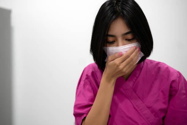 asian patient woman wearing protection face mask cought - cought imagens e fotografias de stock