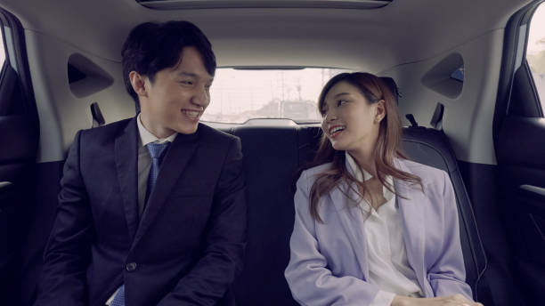 istock Business couple having discussion in car 1335167222