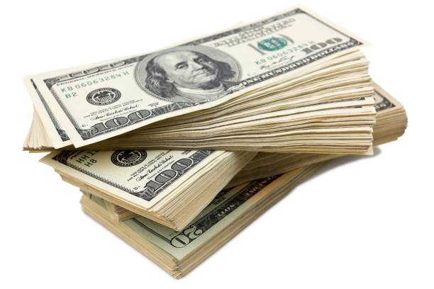 istock heap of a dollar banknotes on a white background 1335169209