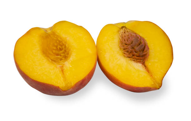 istock Whole peach and sliced isolated on a white background 1335169362