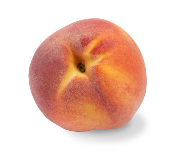 Ripe red and yellow peach isolated on a white background