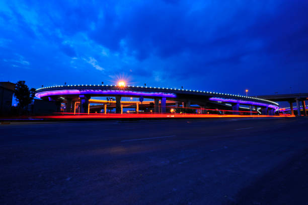 istock Bridge, the city at night 1335172904