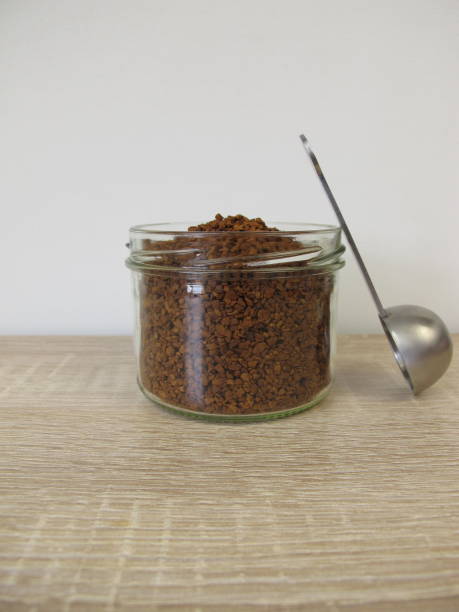 istock Soluble bean coffee, instant coffee in a glass jar 1335173804
