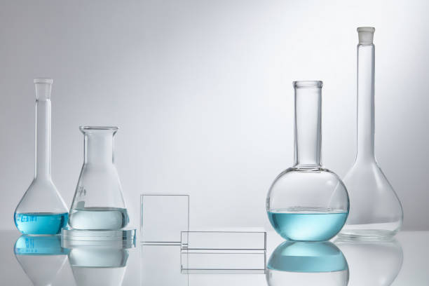 istock Scientific laboratory glassware group with transparent liquid solution, Research and development concept. 1335176323