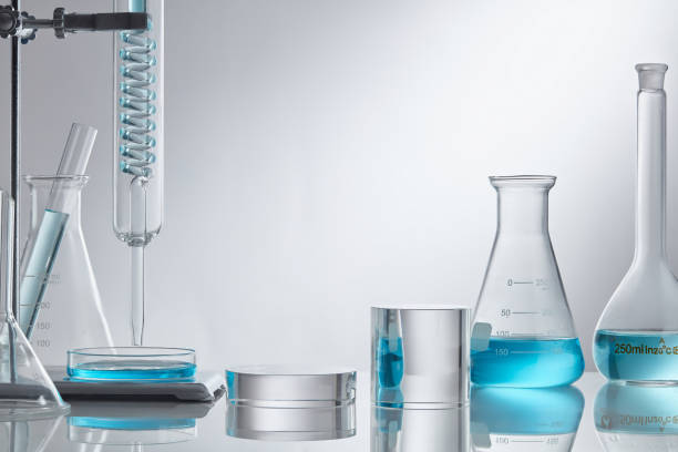 istock Scientific laboratory glassware group with transparent liquid solution, Research and development concept. 1335176342