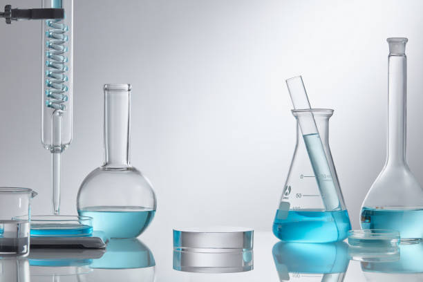 istock Scientific laboratory glassware group with transparent liquid solution, Research and development concept. 1335176405