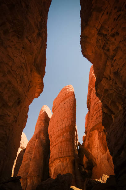 Bottom-up view to Abstract Rock formation at plateau Ennedi aka stone forest in Chad Bottom-up view to Abstract Rock formation at plateau Ennedi aka stone forest , Chad ennedi mountains photos stock pictures, royalty-free photos & images