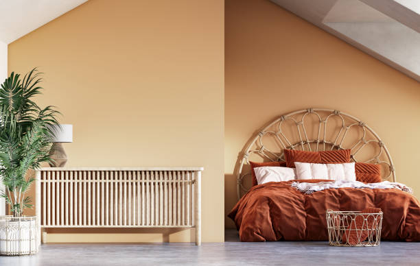 istock Cozy colored bedroom interior background in attic 1335182610