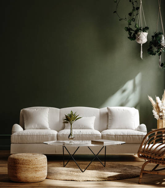 istock Dark green home interior with white sofa, table and decor in living room 1335182625