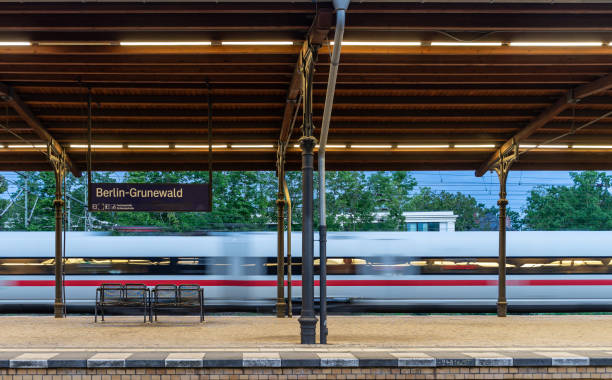 istock Blurred Motion Of Train At Railroad Station 1335184024