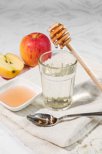 Apple cider vinegar with honey and water