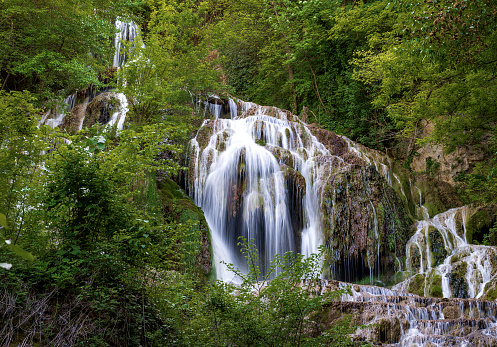 Waterfall in nature. Mountain cascade river waterfall.