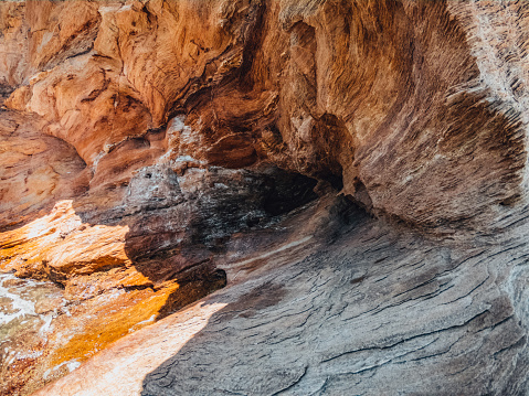 Small Cave Formed on the Cliffs on the Beach