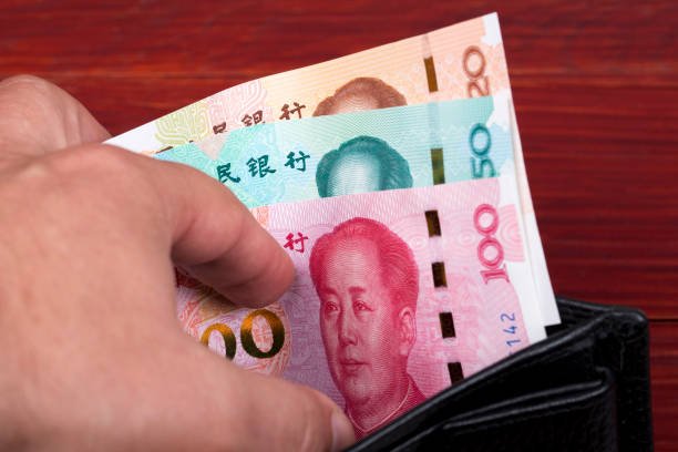 istock Chinese money in the black wallet 1335193107
