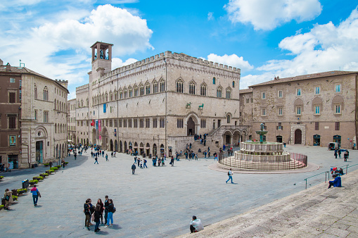 Perugia, Italy - 5 May 2019 - A characteristic views of historical center in the beautiful medieval and artistic city, capital of Umbria region, in central Italy. Here in particular with the central square and monumental fountain