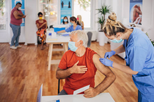 istock Man receiving a vaccine 1335194517