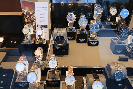 Emporio Armani brand wrist watches on display in a store in Bochum, Germany. Emporio Armani is one of brands of Armani luxury Italian fashion house.