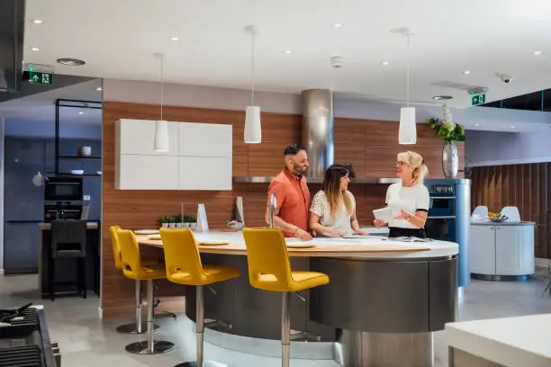 Photo of Couple Viewing Luxury Kitchens