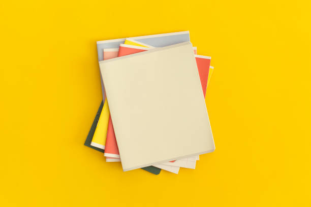 istock Notebooks on yellow background. Top view. Flat lay. Back to school concept. 1335201998