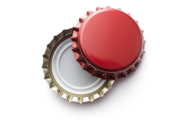 Drinks: Bottle Caps Isolated on White Background Drinks: Bottle Caps Isolated on White Background bottle cap stock pictures, royalty-free photos & images