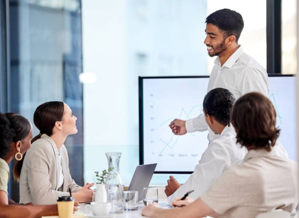 istock Shot of a young man giving a presentation in a modern office 1335210031