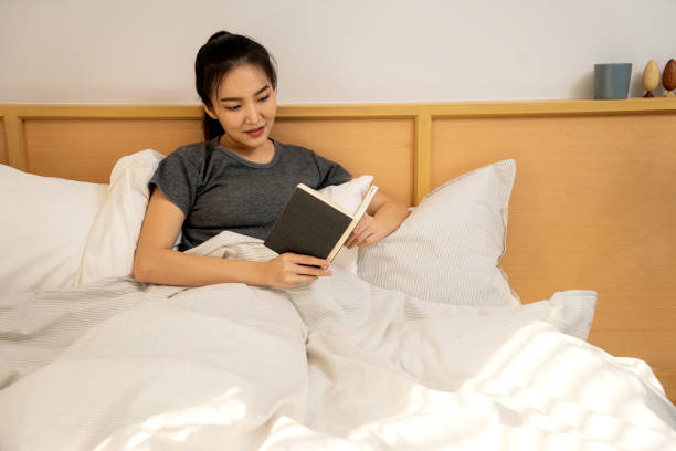 istock Relax asian woman in casual ware lying 1335210463