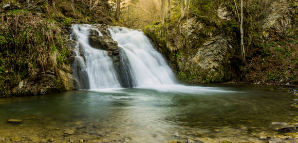 istock Hurkalo waterfall in carpathian forest 1335210748