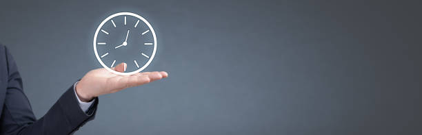 Businessman holding clock. Business time management. business time is money. banner, copy space. Businessman showing clock. Businessman holding clock. Business time management. Businessman hand holding clock, Business time management and business plans concepts. banner, copy space information sign photos stock pictures, royalty-free photos & images