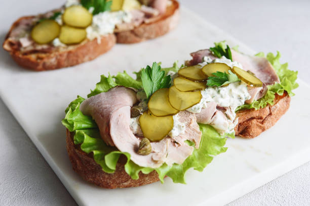 istock Roast beef, pickle and cheese with remoulade (danish tartar sauce) Smorrebrod 1335217732