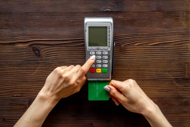 istock Hand paying by card with pos payment terminal. Payment transactions concept 1335220485