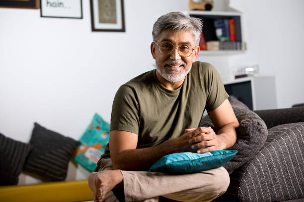 istock Thoughtful mature man at home 1335223074