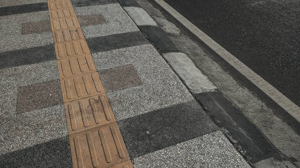 istock Special lane for the blind on the pedestrian path 1335223489