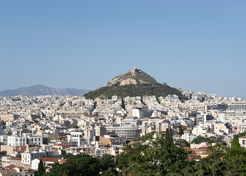 Athens, Greece. July 15, 2021. View of Athens and Mount Lycabettus from above.