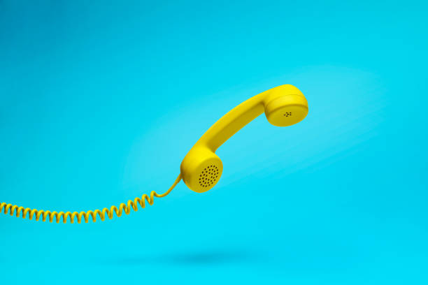 istock Telephone headset in retro style on blue background 1335223746