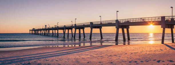istock Fishing Pier Beach Landscape Sunset 1335232519