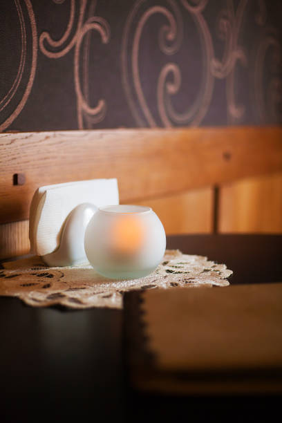 istock beautiful coffee house in interesting design, cosiness, candle, table, serving 1335236778