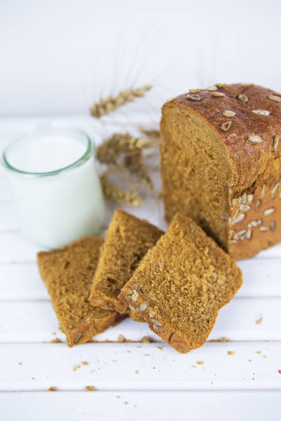 istock Sliced rye bread on cutting board closeup 1335238649