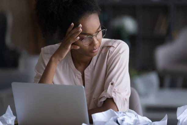 istock Unhappy ethnic woman distressed with work deadline 1335240348
