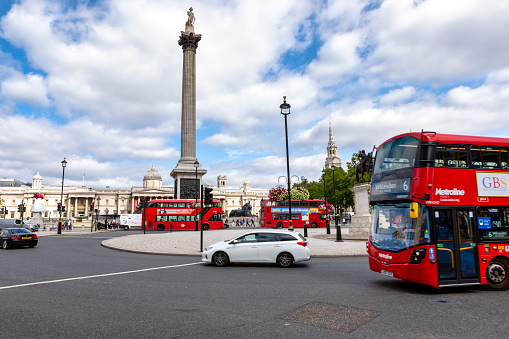 London, UK - Aug 19 2021: Nelson's Column dedicated to Admiral Horatio Nelson, who died at the Battle of Trafalgar in 1805, it's constructed between 1840 and 1843 to a design by William Railton