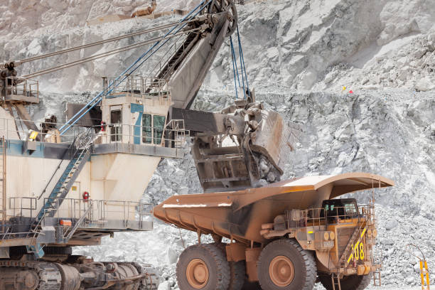 istock Electric rope shovel loading a dump truck 1335246710